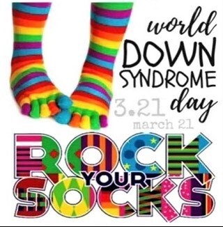Picture of rainbow sock toes that says World Down Syndrome Day on 3.21. Rock Your Socks.